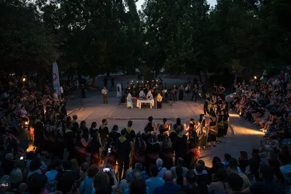 At dusk the dancers form a circle among the audience